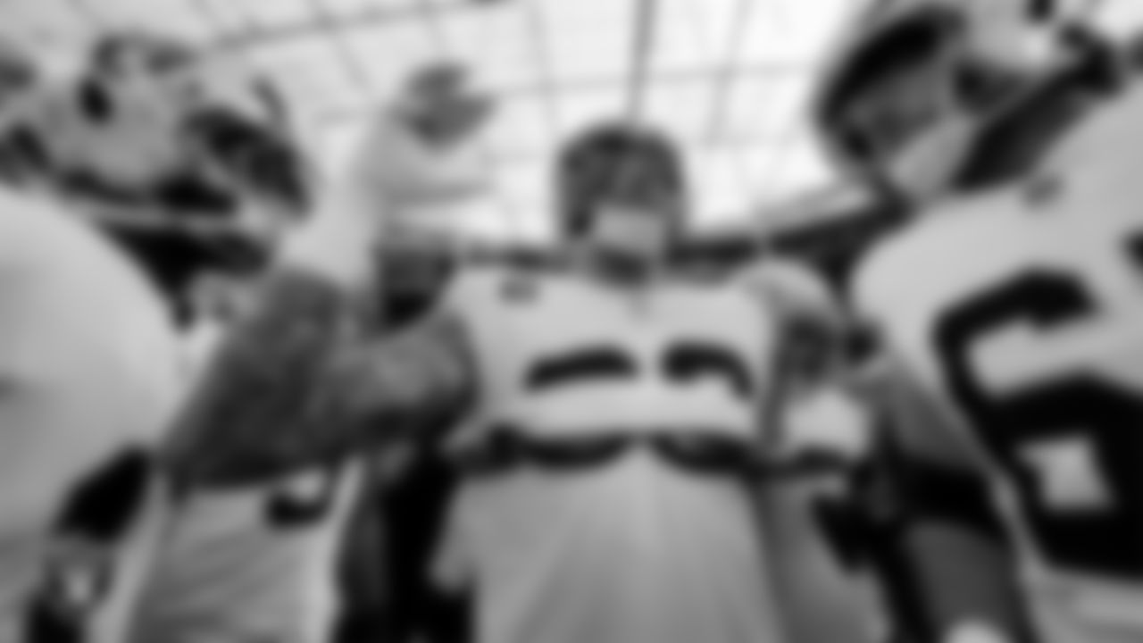 The Las Vegas Raiders huddle before the regular season away game against the Los Angeles Chargers at SoFi Stadium.