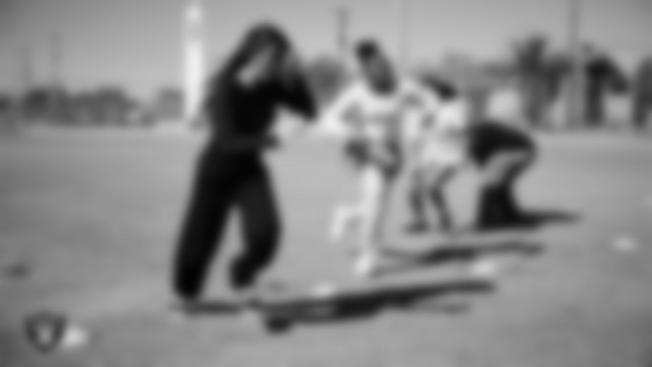 Students participate in activities while learning about flag football, nutrition and mental health during the R.U.S.H. program at J.D. Smith Middle School.