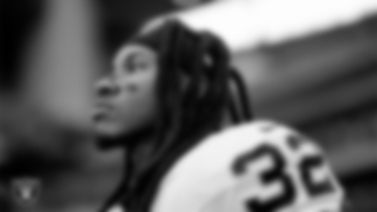 Las Vegas Raiders safety Lonnie Johnson Jr. (32) on the sidelines before the regular season away game against the Houston Texans at NRG Stadium.