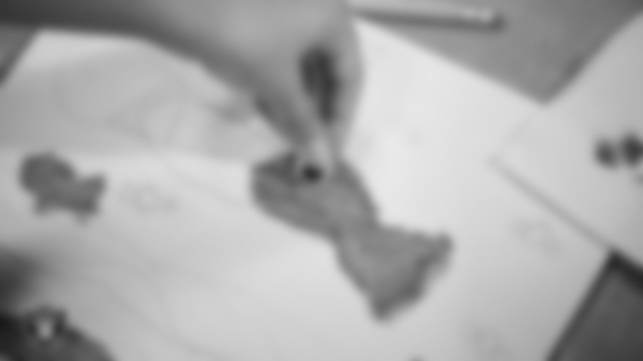 A dancer works on an art project during day one of summer camp at The Studio.