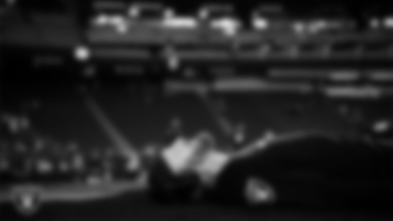 Las Vegas Raiders defensive end Maxx Crosby (98) warming up before the regular season home game against the Dallas Cowboys at Allegiant Stadium.