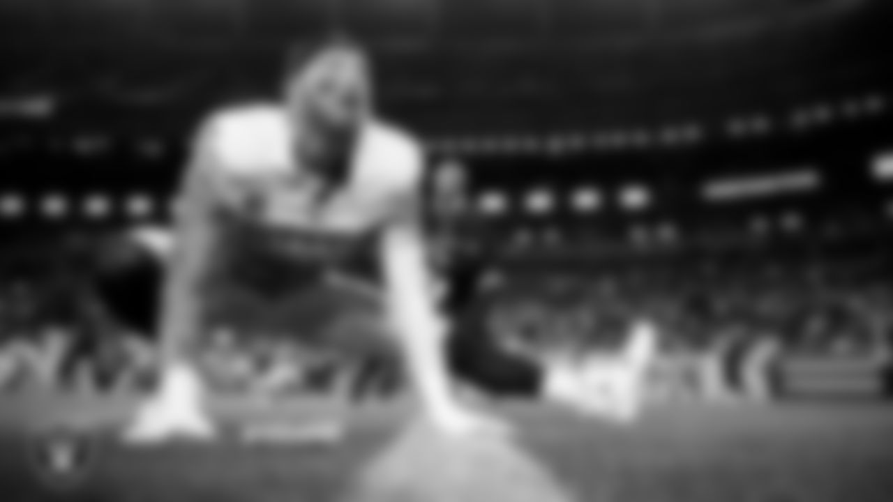 Las Vegas Raiders defensive end Maxx Crosby (98) warming up before the regular season away game against the Denver Broncos at Empower Field at Mile High.