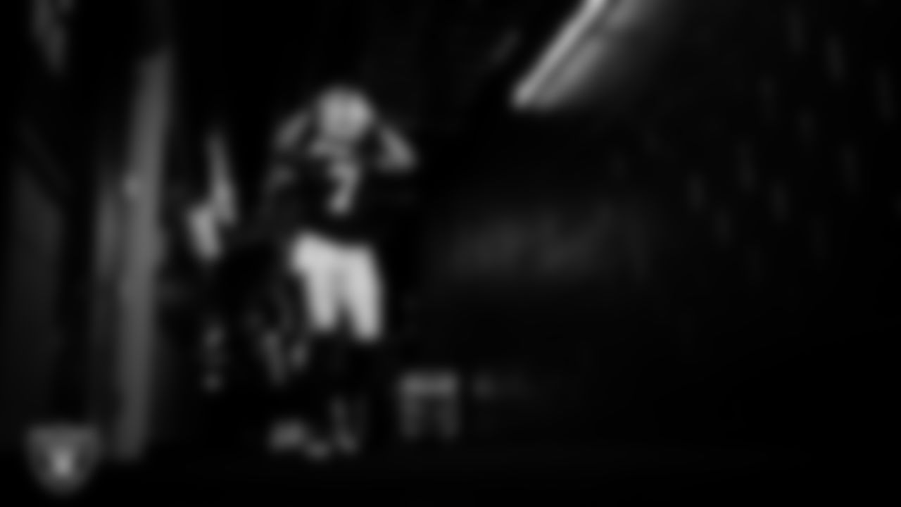 Las Vegas Raiders quarterback Geno Smith (7) walks down the tunnel before the regular season home game against the New York Giants at Allegiant Stadium.