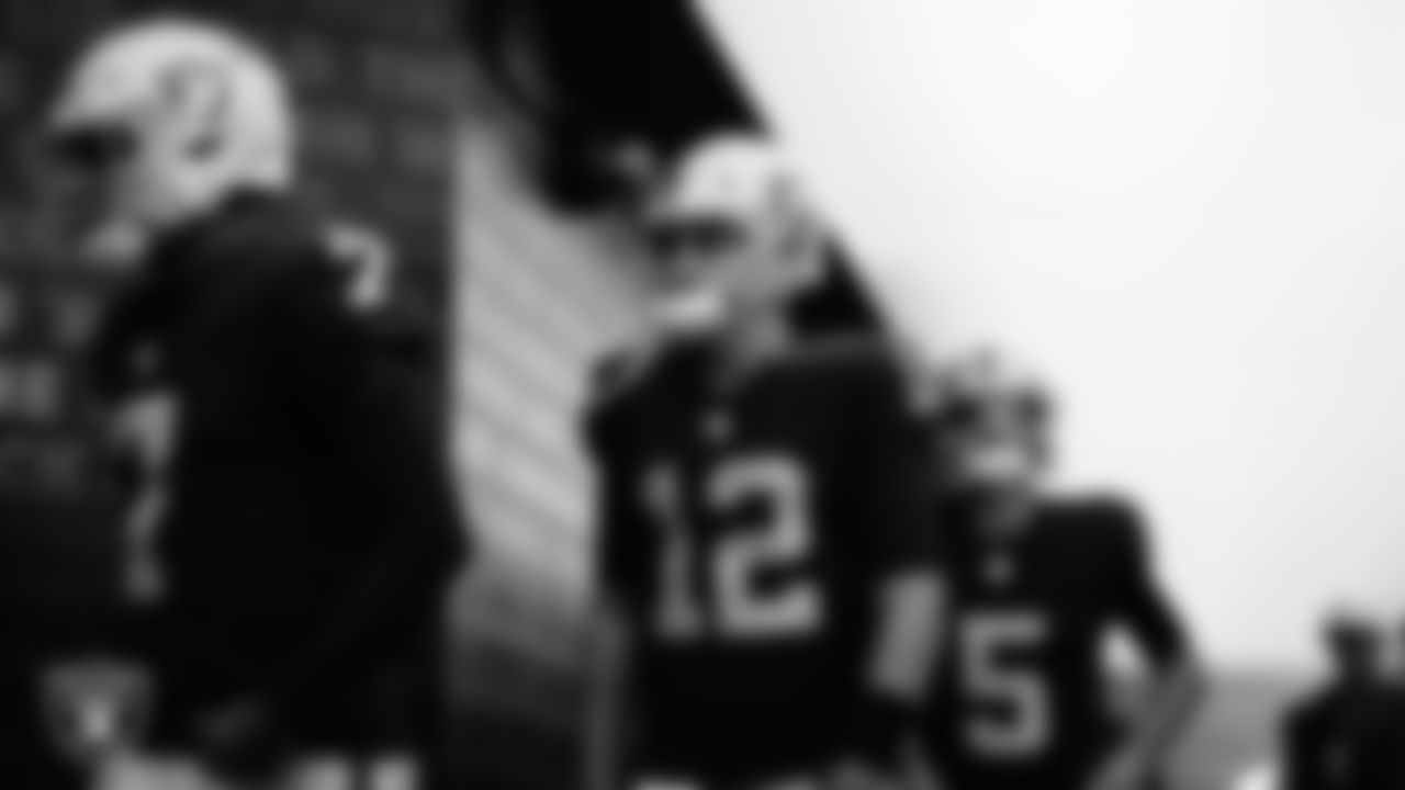 Las Vegas Raiders quarterback Aidan O'Connell (12) walks out to the field for warm ups before the preseason home game against the San Francisco 49ers at Allegiant Stadium.