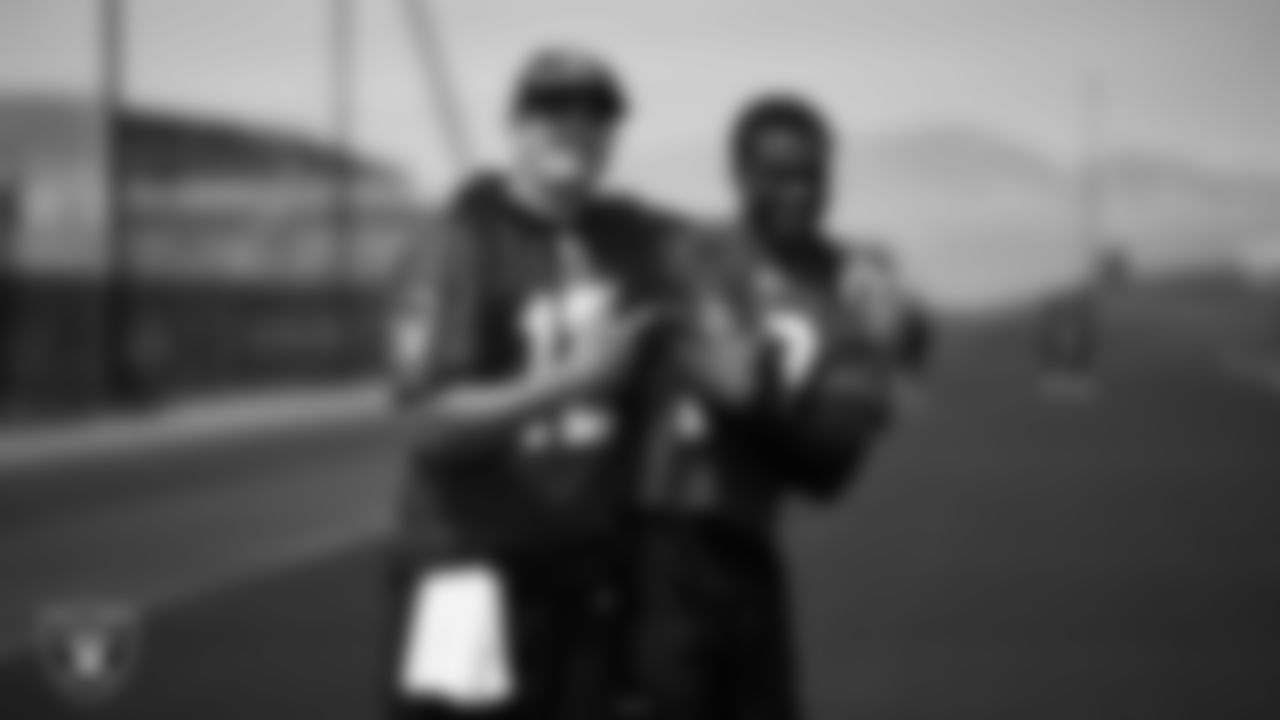 Las Vegas Raiders quarterback Aidan O'Connell (12) and quarterback Anthony Brown Jr. (13) at a workout during phase two of the offseason program at Intermountain Health Performance Center.