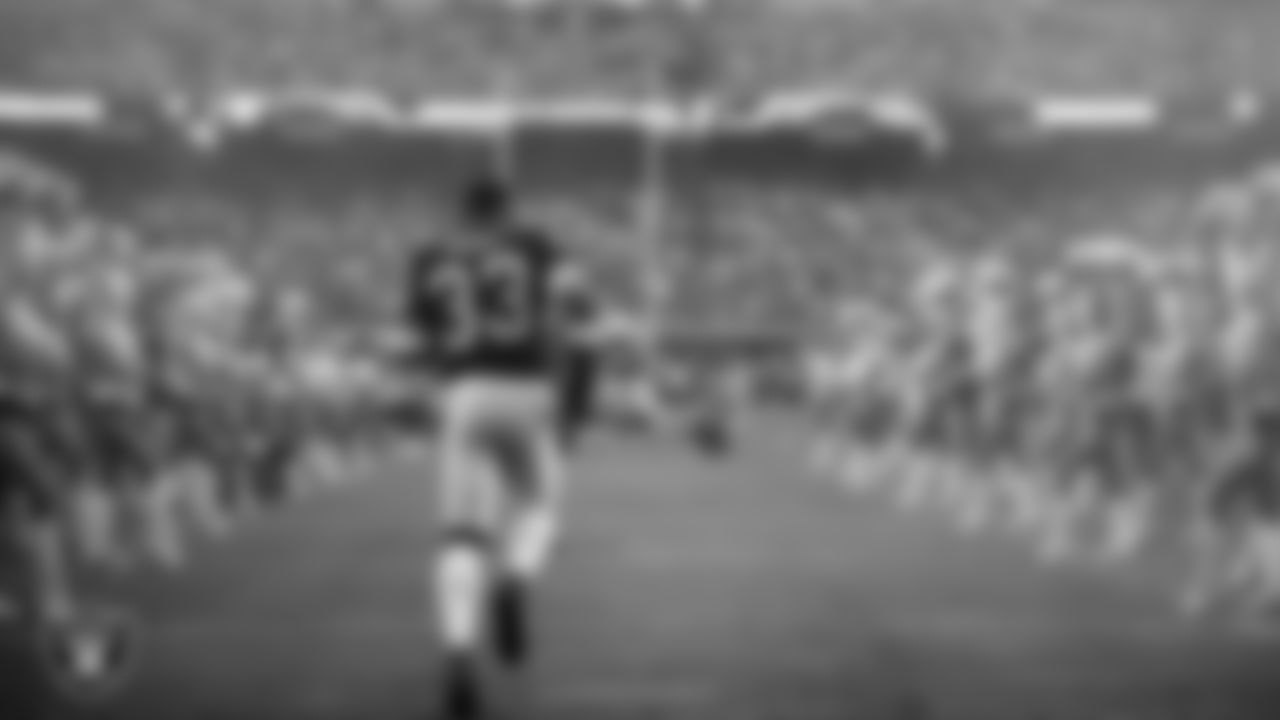 Las Vegas Raiders linebacker Jamal Adams (33) is introduced onto the field before the regular season home game against the Denver Broncos at Allegiant Stadium.