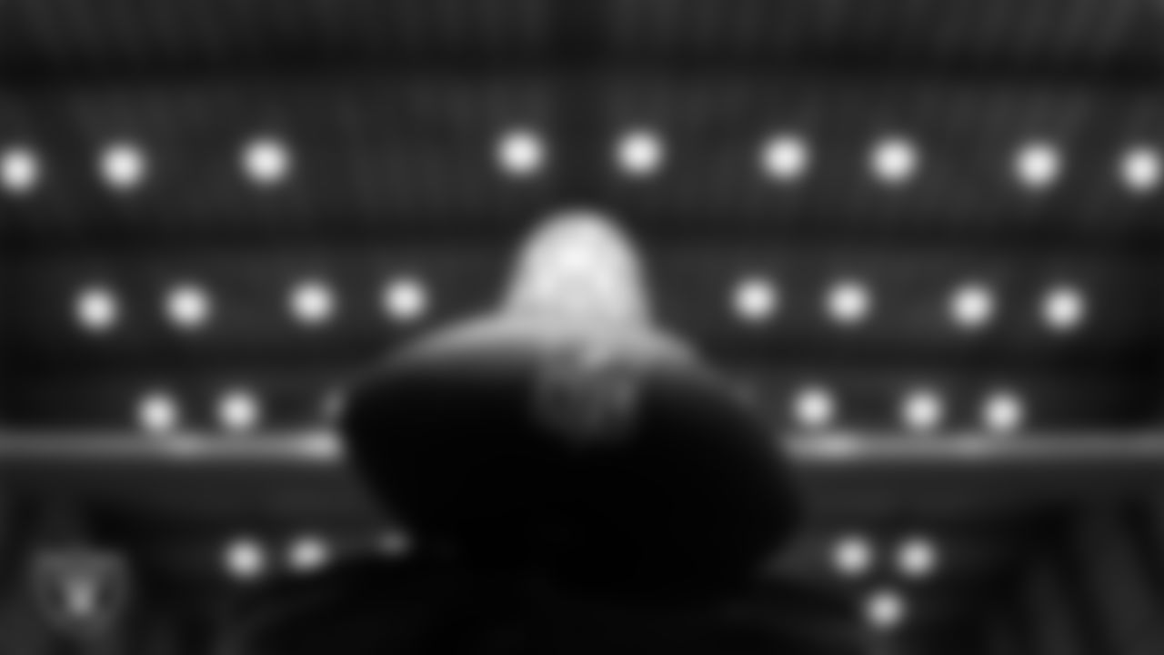 A football on the field during practice at Intermountain Health Performance Center.