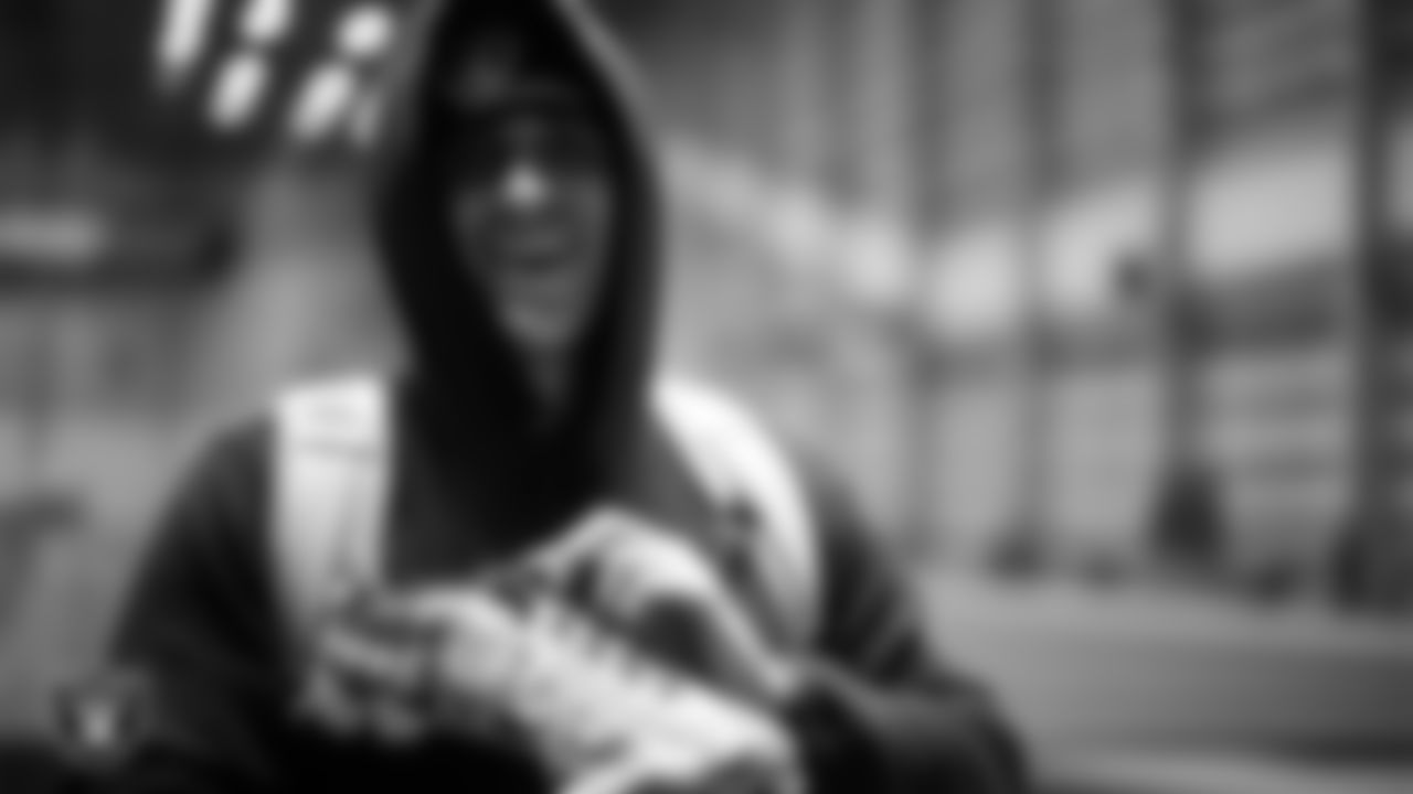 Las Vegas Raiders wide receiver Jack Bech (18) unboxes his custom cleats for the NFL's My Cause My Cleats initiative at Intermountain Health Performance Center.