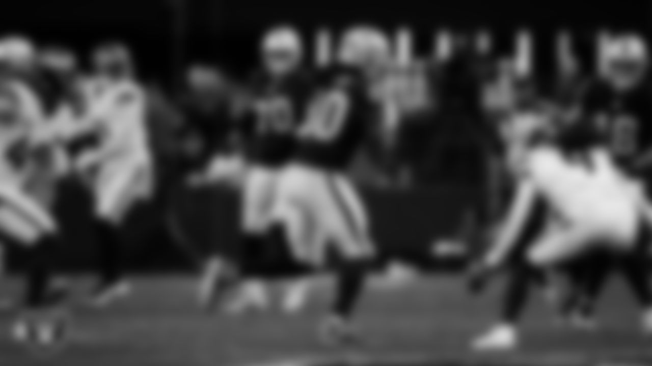 Las Vegas Raiders tight end Ian Thomas (80) runs after making a catch during the regular season home game against the Denver Broncos at Allegiant Stadium.