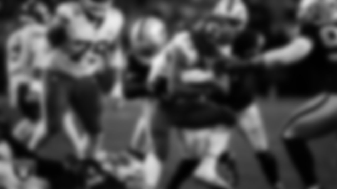 Las Vegas Raiders linebacker Elandon Roberts (52) makes a tackle during the regular season home game against the Kansas City Chiefs at Allegiant Stadium.