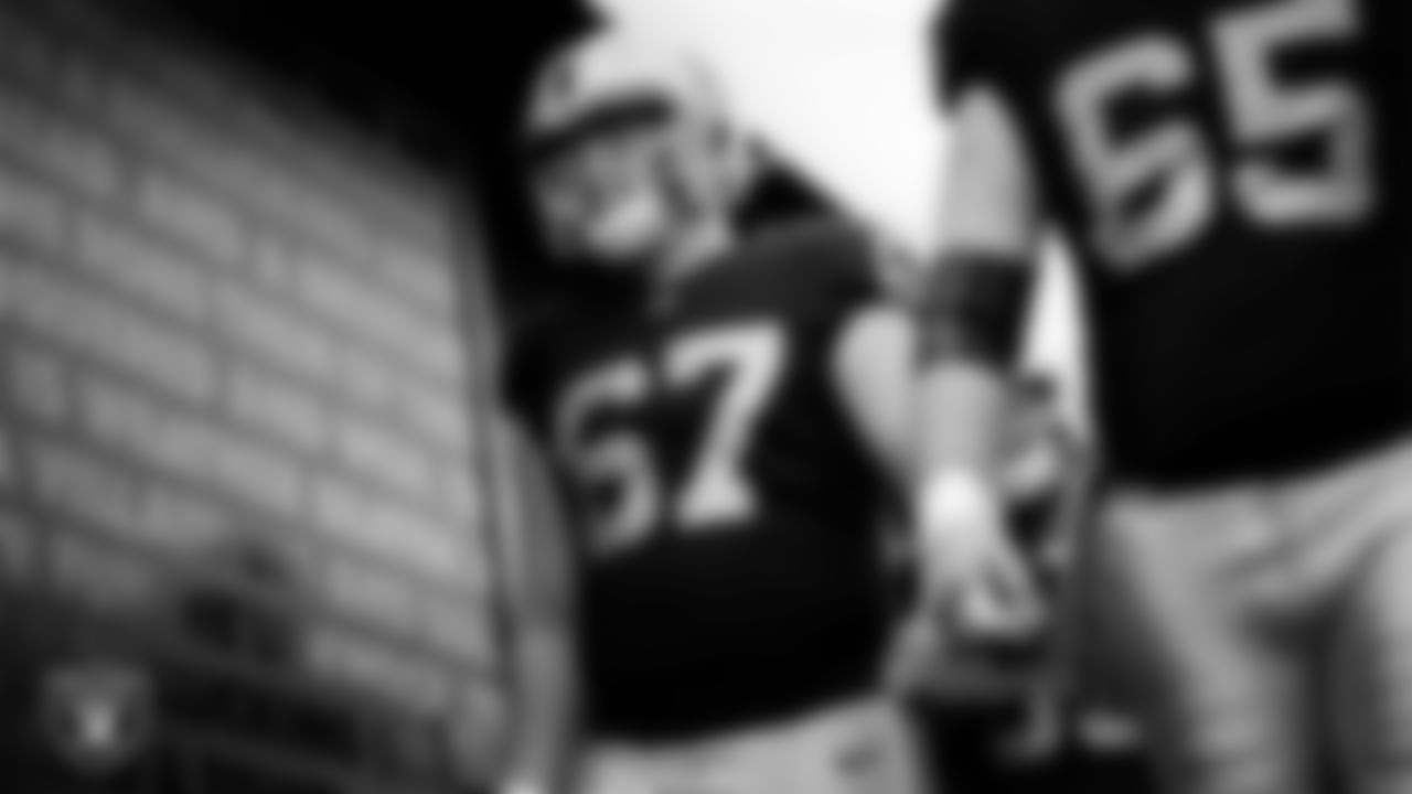 Las Vegas Raiders center Will Putnam (67) walks down the tunnel before the regular season home game against the Dallas Cowboys at Allegiant Stadium.