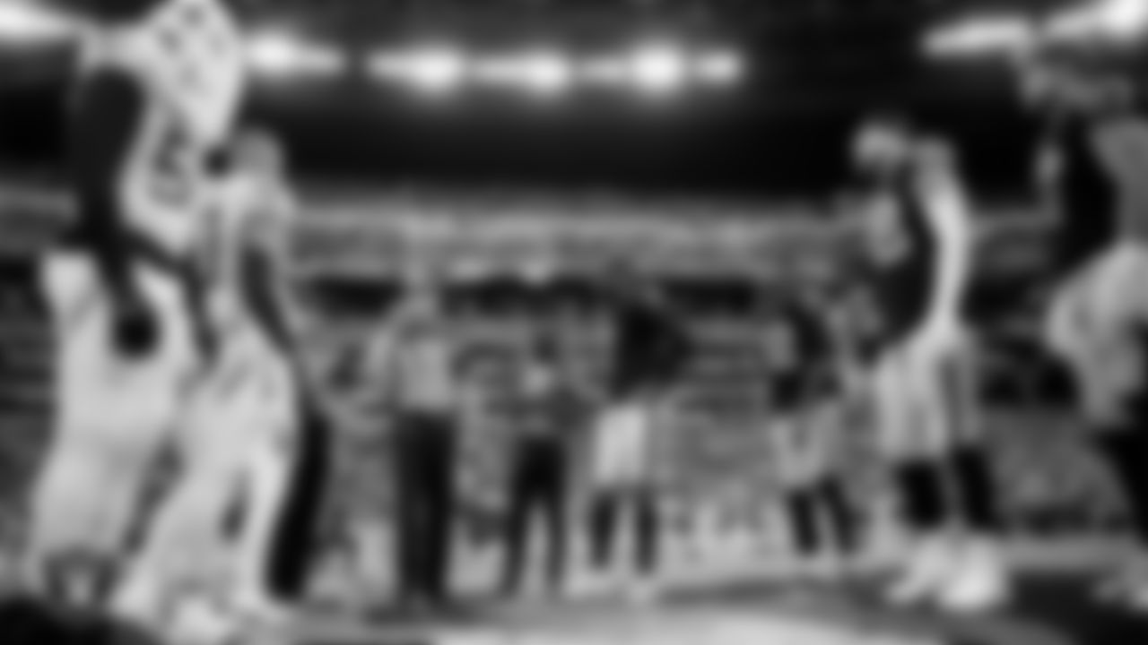 Las Vegas Raiders quarterback Geno Smith (7), cornerback Eric Stokes (22), punter AJ Cole (6), defensive end Maxx Crosby (98) and tight end Michael Mayer (87) during the coin toss before the regular season home game against the Tennessee Titans at Allegiant Stadium.