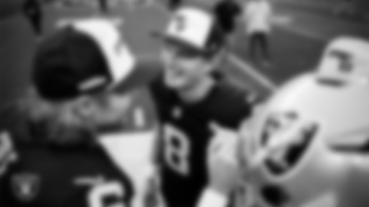 Las Vegas Raiders kicker Daniel Carlson (8) in a huddle before the regular season home game against the New York Giants at Allegiant Stadium.