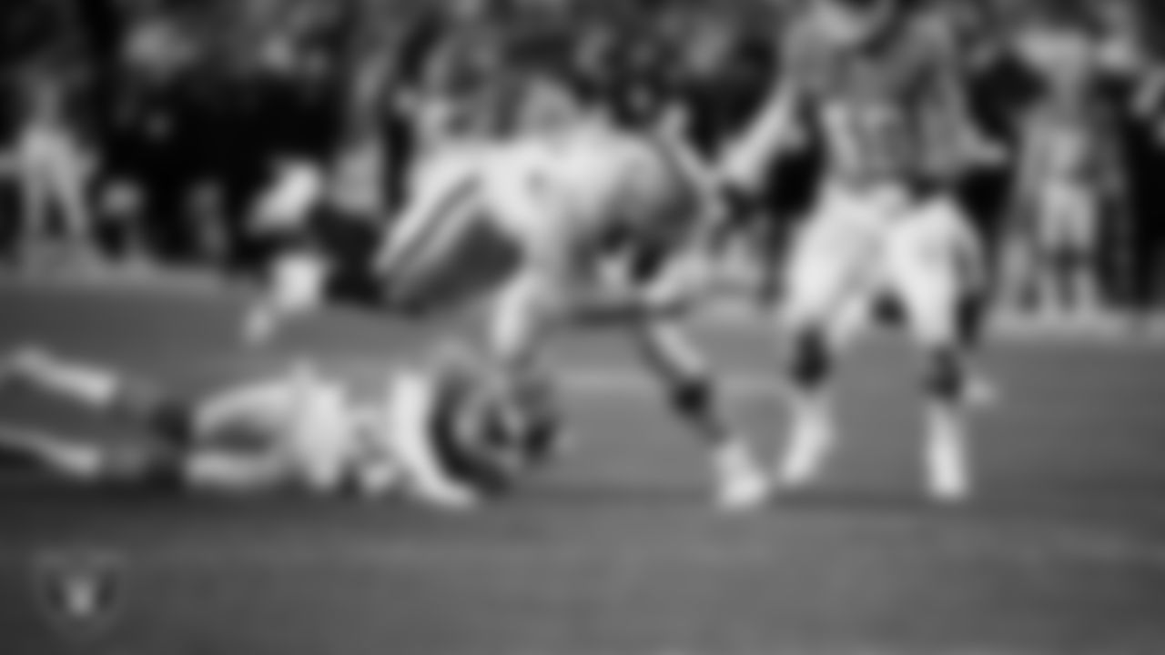 Las Vegas Raiders tight end Michael Mayer (87) runs after making a catch during the regular season away game against the Denver Broncos at Empower Field at Mile High.