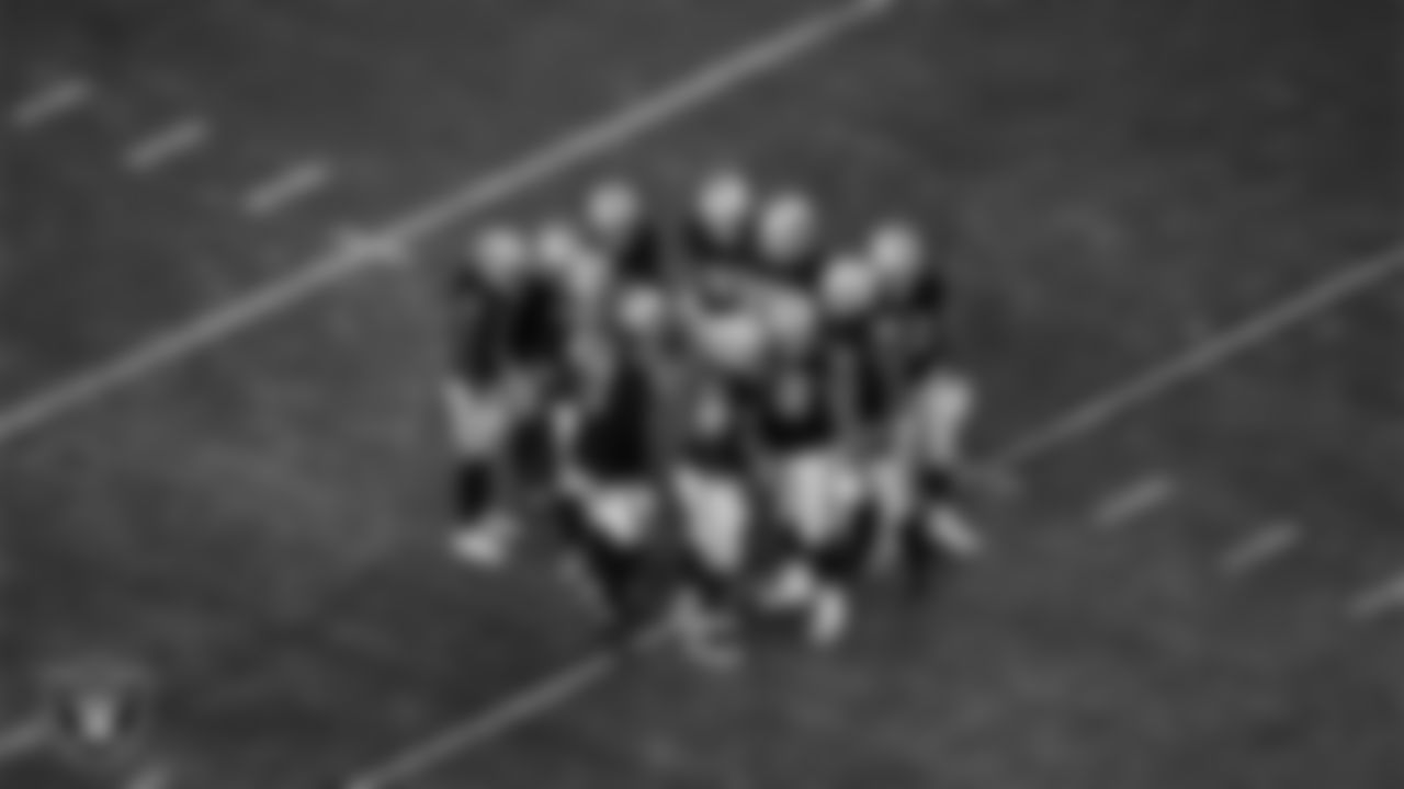 The Las Vegas Raiders huddle during the regular season home game against the New York Jets at Allegiant Stadium.