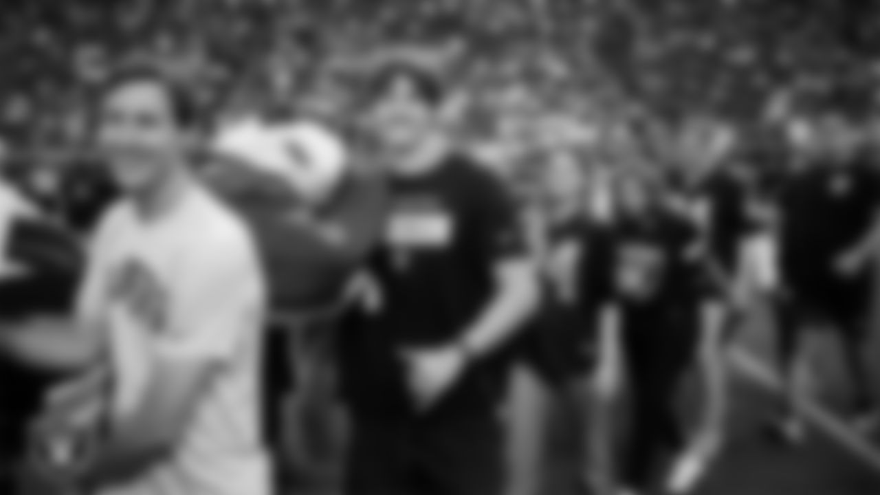 The American flag is displayed by Personal Seat License (PSL) holders on the field during the national anthem before the Las Vegas Raiders' regular season home game against the Jacksonville Jaguars at Allegiant Stadium.
