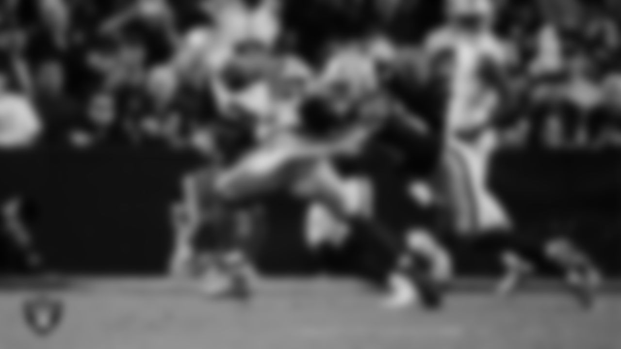 Las Vegas Raiders safety Isaiah Pola-Mao (20) makes a tackle during the regular season home game against the Dallas Cowboys at Allegiant Stadium.