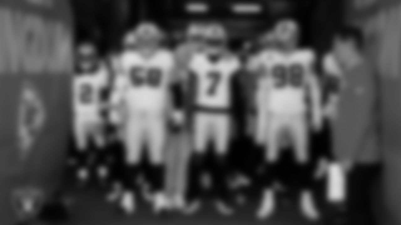 The Las Vegas Raiders wait to be introduced onto the field before the regular season away game against the Kansas City Chiefs at GEHA Field at Arrowhead Stadium.