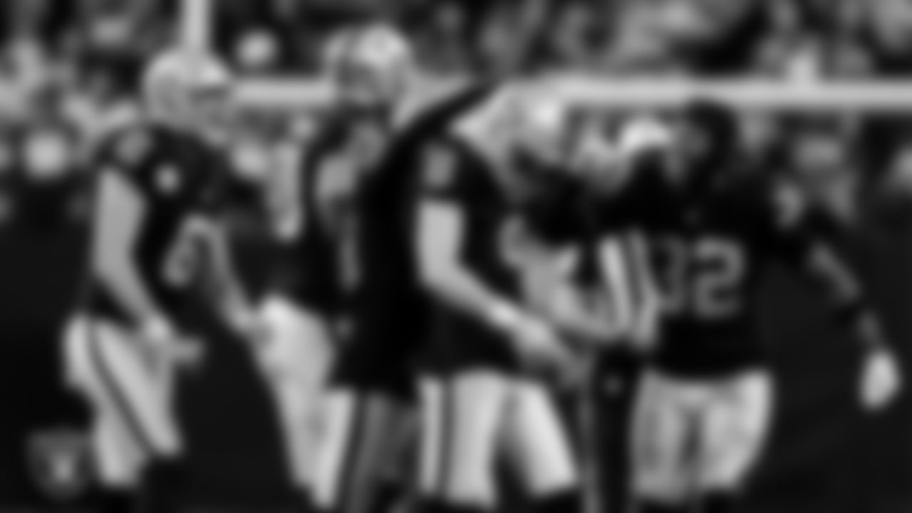 Las Vegas Raiders kicker Daniel Carlson (8) celebrates with teammates after kicking a 60-yard field goal during the regular season home game against the Kansas City Chiefs at Allegiant Stadium.