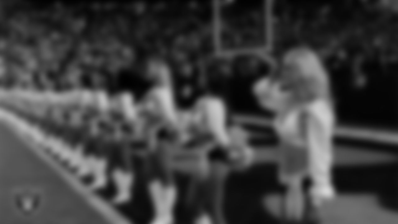 Raiderette Jessica during the national anthem before the regular season home game against the Dallas Cowboys at Allegiant Stadium.