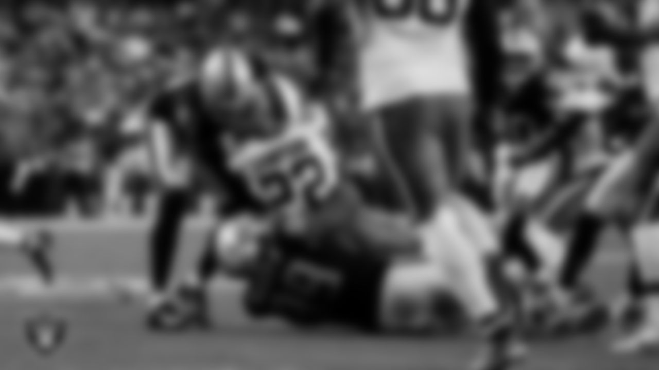 Las Vegas Raiders defensive end Malcolm Koonce (51) and defensive tackle Thomas Booker IV (99) during the regular season home game against the Cleveland Browns at Allegiant Stadium.