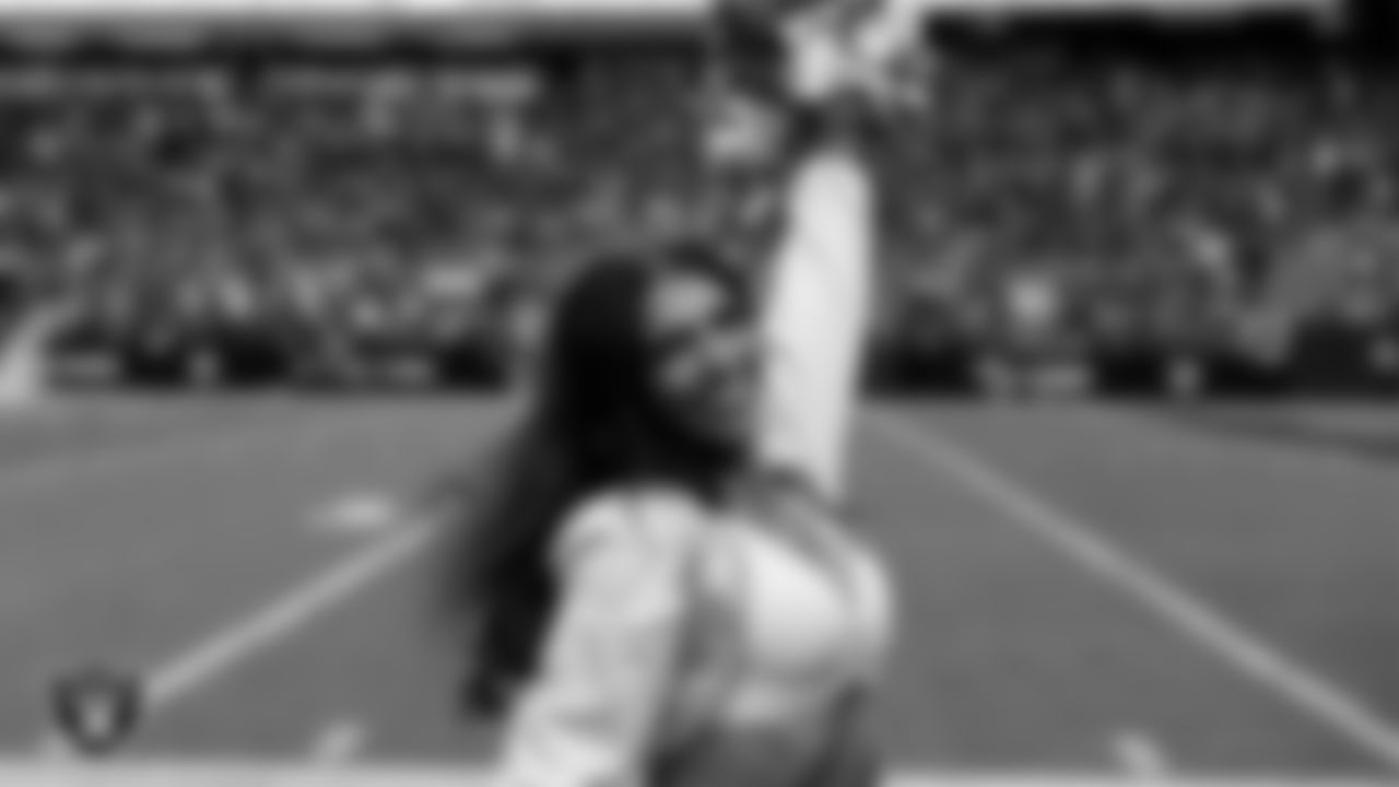 Raiderette Ashtin on the sidelines during the regular season home game against the Jacksonville Jaguars at Allegiant Stadium.