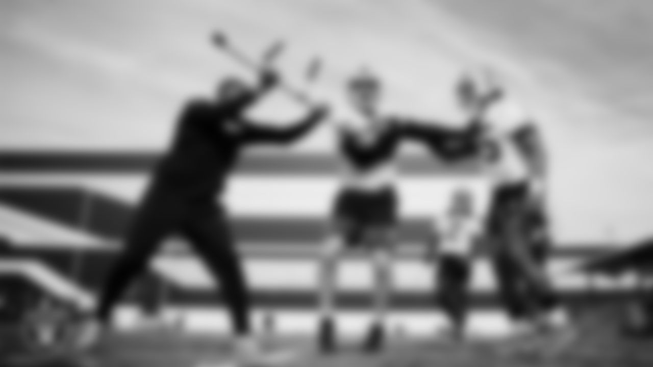 Las Vegas Raiders running backs coach Deland McCullough, running back Dylan Laube (23) and running back Chris Collier (35) during practice at Intermountain Health Performance Center.