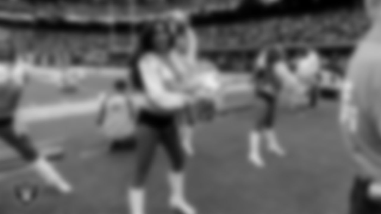 Raiderette Meekela on the sidelines during the preseason home game against the San Francisco 49ers at Allegiant Stadium.