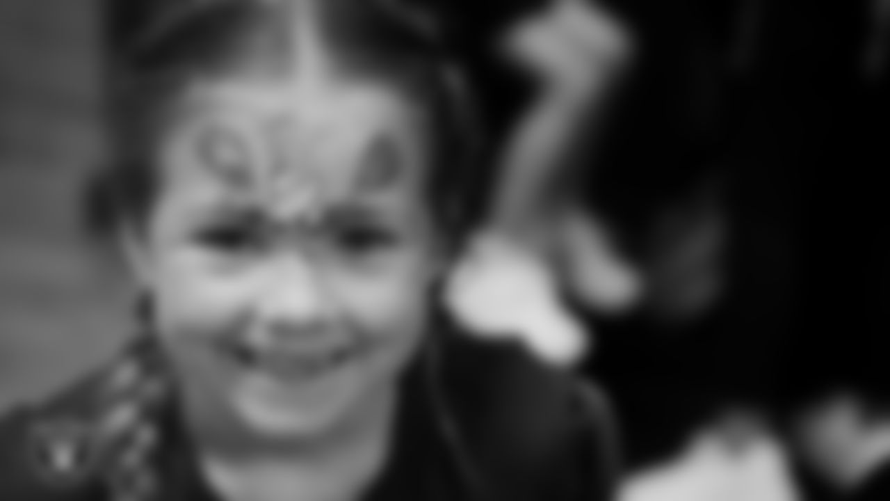 A dancer shows off her painted face during day two of summer camp at The Studio.