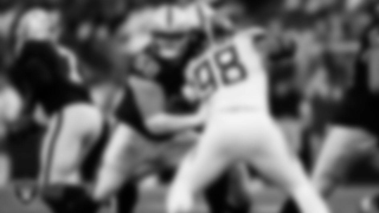 Las Vegas Raiders guard/center Jackson Powers-Johnson (58) blocks during the regular season home game against the Tennessee Titans at Allegiant Stadium.