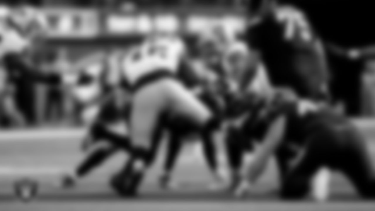 Las Vegas Raiders linebacker Devin White (45) and defensive end Maxx Crosby (98) during the regular season away game against the Los Angeles Chargers at SoFi Stadium.