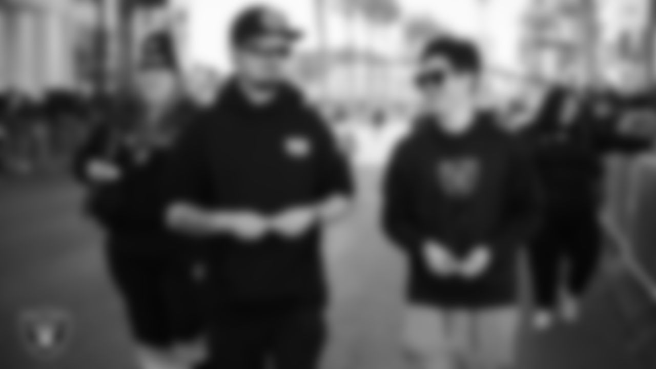 Las Vegas Raiders senior videographer/editor Sam Freed and videographer/editor Kai Hashimoto during the Martin Luther King Jr. Day Parade in Downtown Las Vegas.