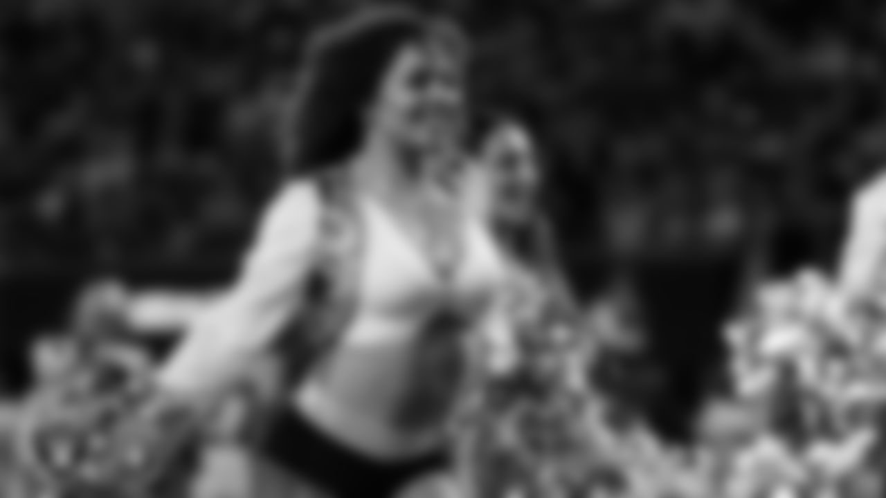 Raiderette Makenna performs on the field during the regular season home game against the Dallas Cowboys at Allegiant Stadium.