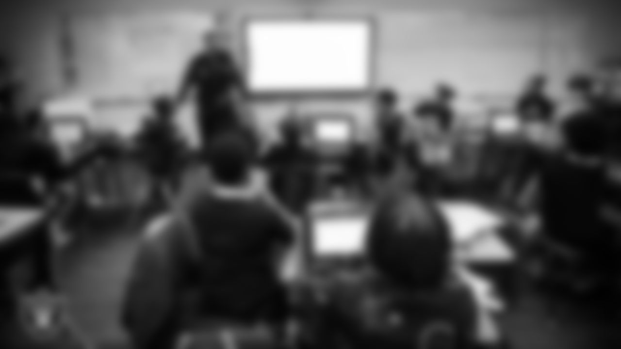 Las Vegas Raiders coordinator of football development Chris Shelby visits students at Matt Kelly Elementary School to congratulate them on winning the Lil' Raiders School Challenge.