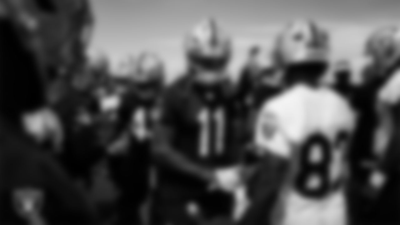 Las Vegas Raiders safety Jeremy Chinn (11) and wide receiver Key'Shawn Smith (83) at an Organized Team Activity (OTA) at Intermountain Health Performance Center.