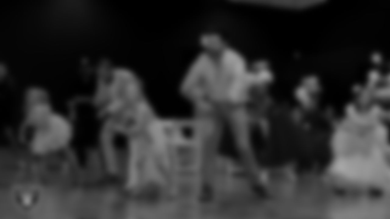 Attendees learn a dance during the Valentine's Day Dance at The Studio.