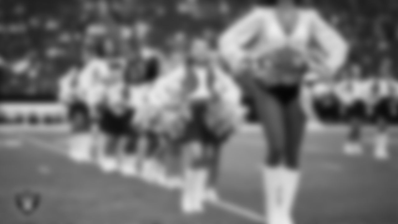 Junior Raiderettes perform on the field before the preseason home game against the San Francisco 49ers at Allegiant Stadium.