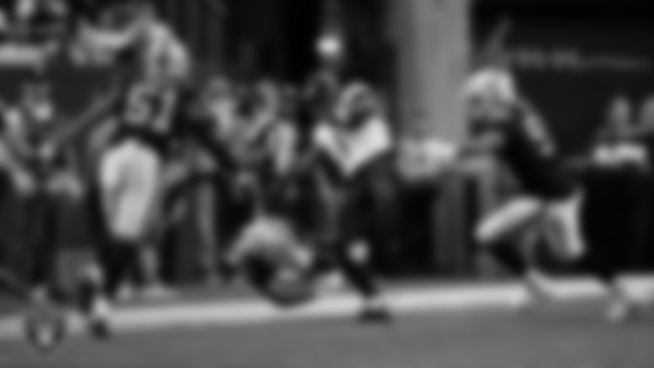 Las Vegas Raiders safety Isaiah Pola-Mao (20) makes a tackle during the regular season home game against the Jacksonville Jaguars at Allegiant Stadium.