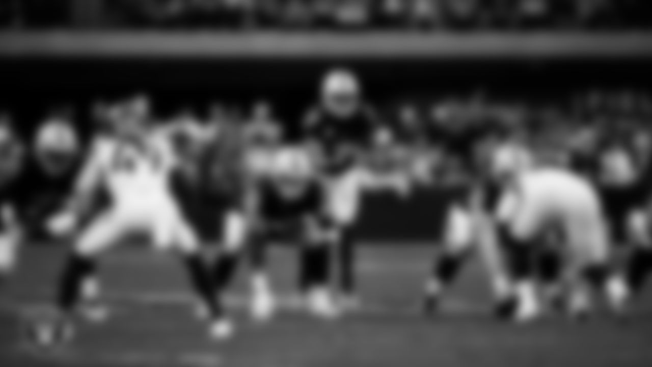 Las Vegas Raiders quarterback Geno Smith (7) lines up before the snap during the regular season home game against the Denver Broncos at Allegiant Stadium.