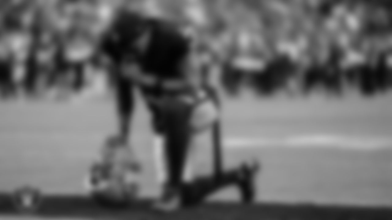Las Vegas Raiders wide receiver DeAndre Carter (3) kneels on the field before the Las Vegas Raiders' regular season home game against the New York Giants at Allegiant Stadium.
