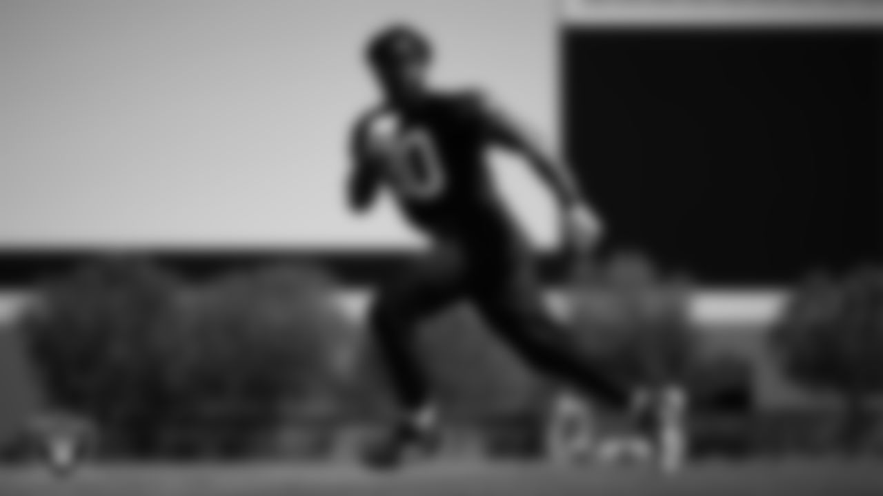 Las Vegas Raiders defensive end Ovie Oghoufo (90) at a workout during phase two of the offseason program at Intermountain Health Performance Center.