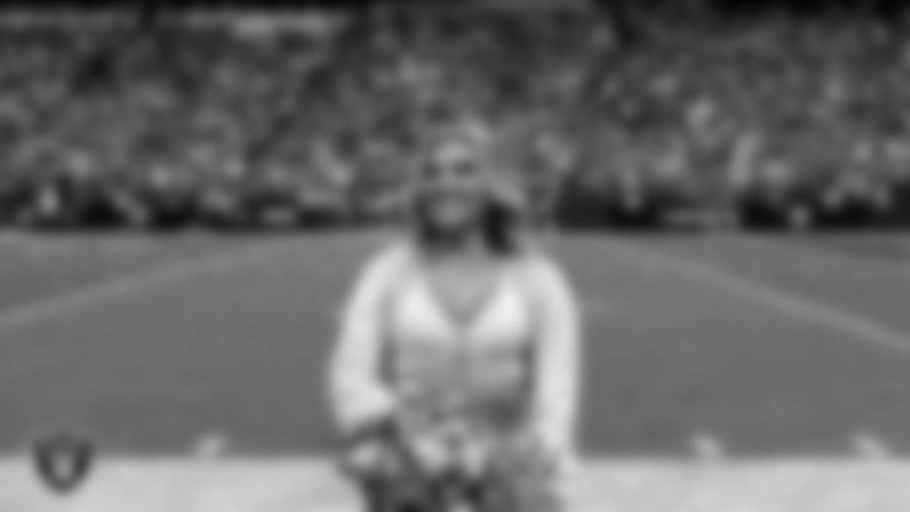 Raiderette Ali on the sidelines during the regular season home game against the Denver Broncos at Allegiant Stadium.