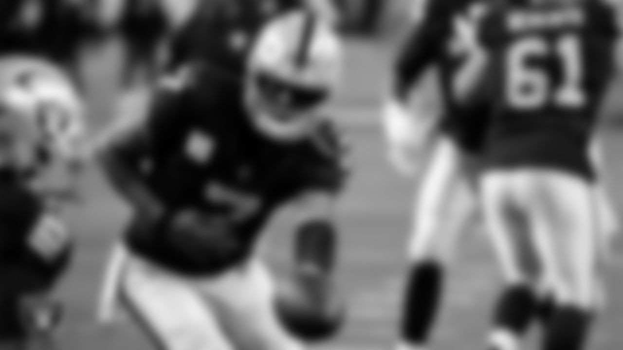 Las Vegas Raiders quarterback Geno Smith (7) warming up before the regular season home game against the Los Angeles Chargers at Allegiant Stadium.