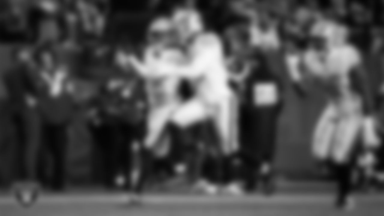 Las Vegas Raiders cornerback Kyu Blu Kelly (36) celebrates with teammates after intercepting a pass during the regular season away game against the Denver Broncos at Empower Field at Mile High.