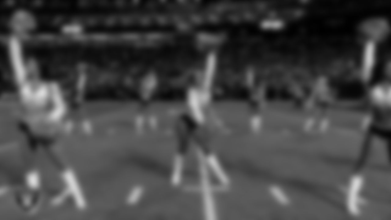 Raiderette Shelby during player introductions before the regular season home game against the Dallas Cowboys at Allegiant Stadium.