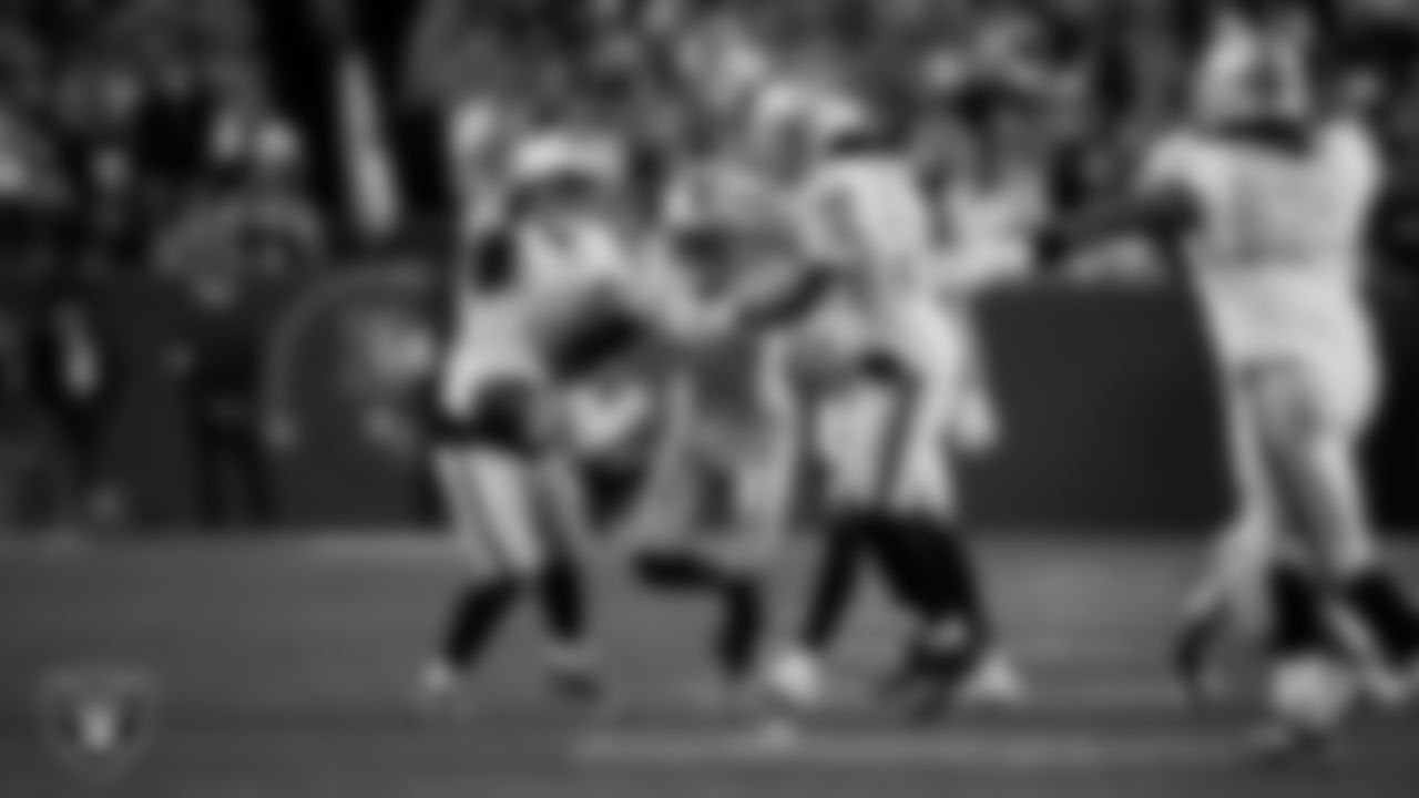 Las Vegas Raiders cornerback Kyu Blu Kelly (36) celebrates with teammates after intercepting a pass during the regular season away game against the Denver Broncos at Empower Field at Mile High.