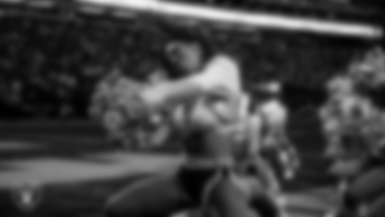 Raiderette Makenna performs on the field during the regular season home game against the Denver Broncos at Allegiant Stadium.