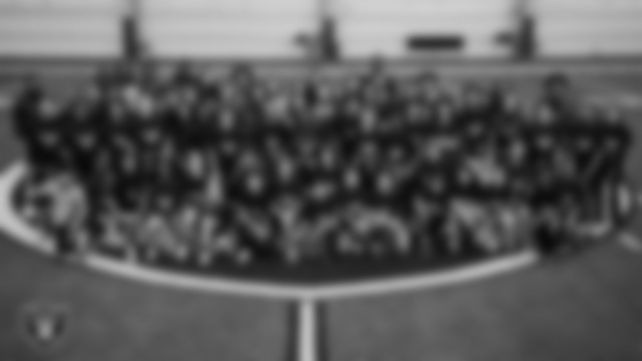 Students pose for a photo with members of the Jackson State University and Grambling State University football teams after a Junior Raiders Training Camp at Intermountain Health Performance Center.