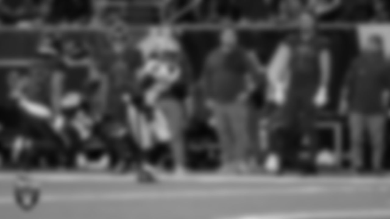 Las Vegas Raiders running back Ashton Jeanty (2) runs after making a 60-yard touchdown catch during the regular season away game against the Houston Texans at NRG Stadium.