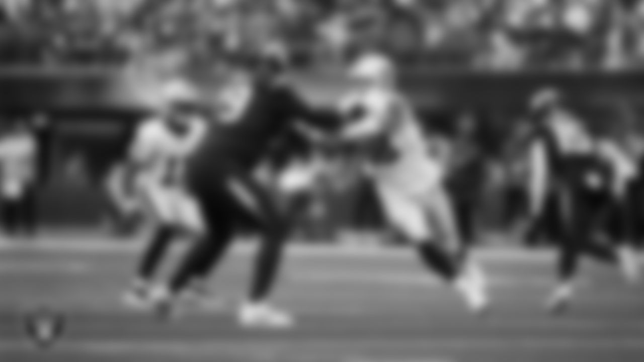 Las Vegas Raiders defensive end Maxx Crosby (98) defends during the regular season away game against the Los Angeles Chargers at SoFi Stadium.